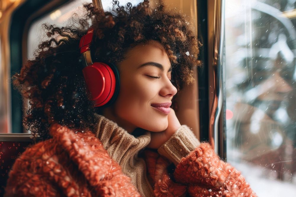 Happy young woman with curly hair wearing headphones happy photography electronics.