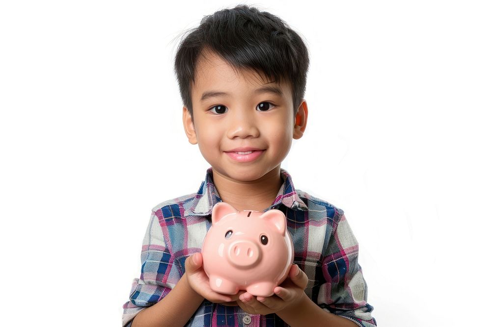 Thai boy holding piggy bank child white background investment.