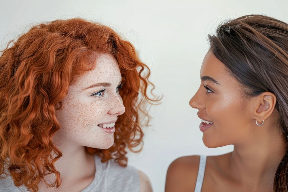 Woman discussing with friend adult photo togetherness.