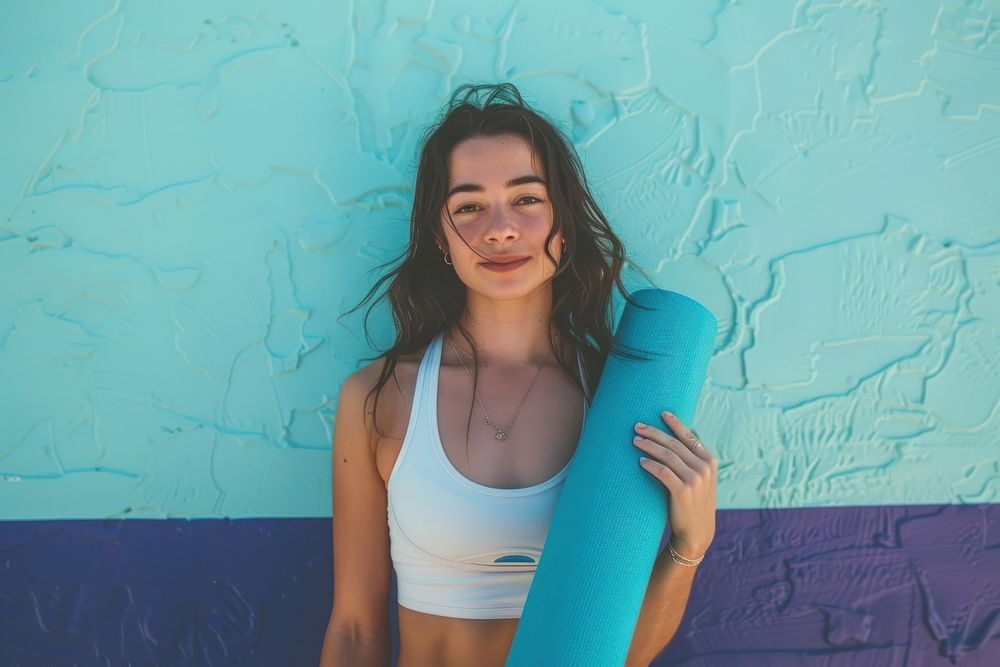 Woman holding yoga mat photo photography accessories.