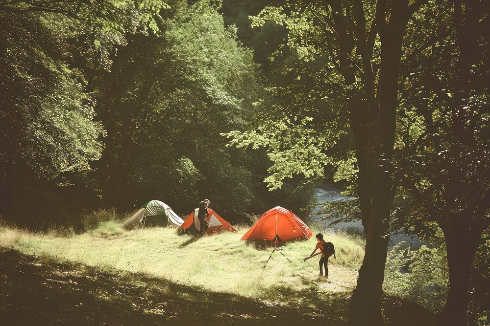 Young people camping architecture vegetation recreation.