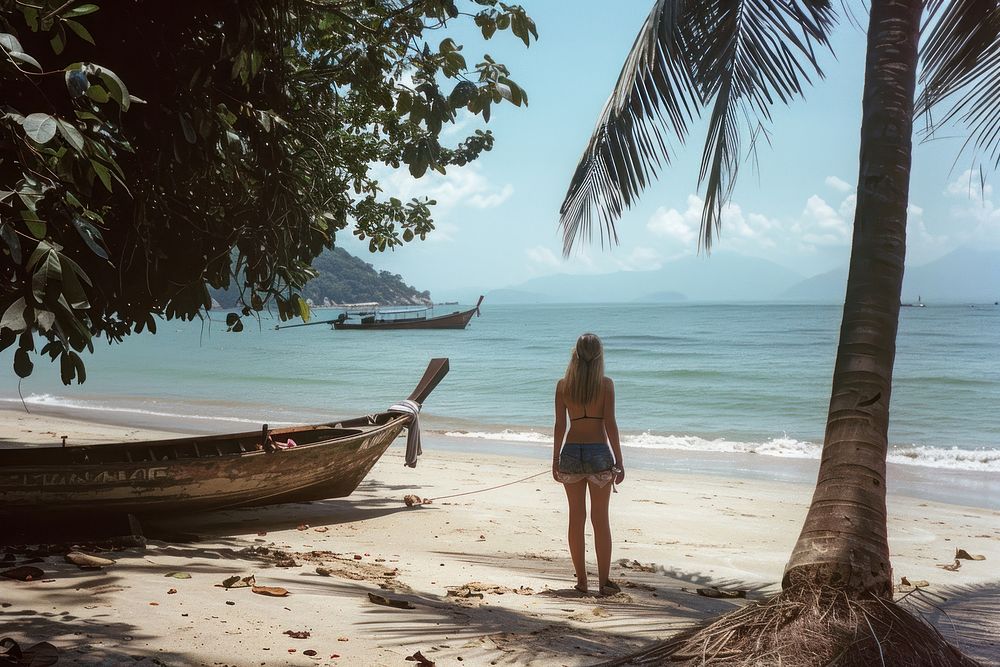 American girl on the Beach in Thailand beach transportation shoreline.