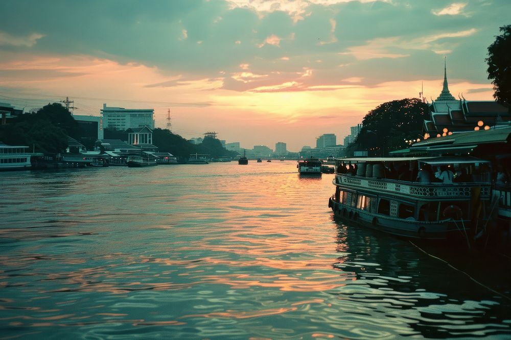 Riverside Chao Phraya River Thailand transportation architecture waterfront.