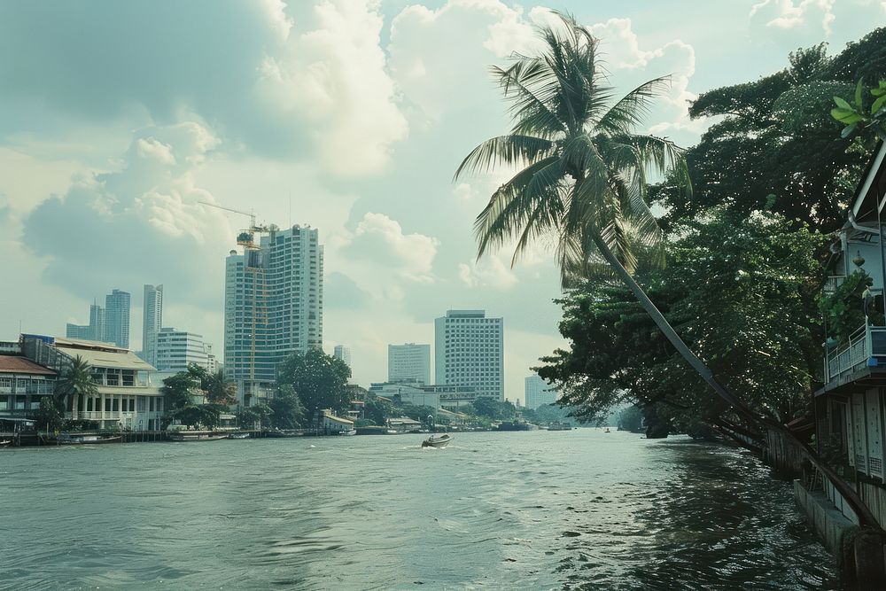 Riverside Chao Phraya River Thailand transportation architecture construction.