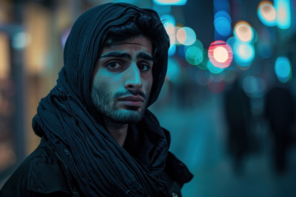 Lonely young Dubai man in the street Dubai photography sad portrait.