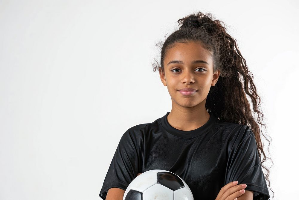 Portrait of young female soccer player with soccer ball standing portrait photography football.