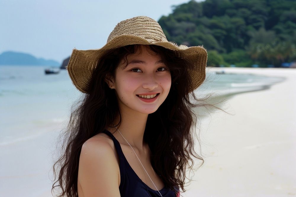 Portrait of beautiful young woman beach photography accessories.