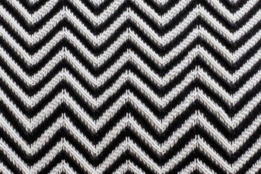 Chevron pattern knitted wool texture clothing apparel.