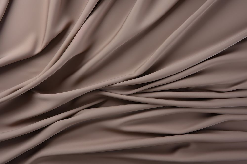 Taupe pleated polyester silk.