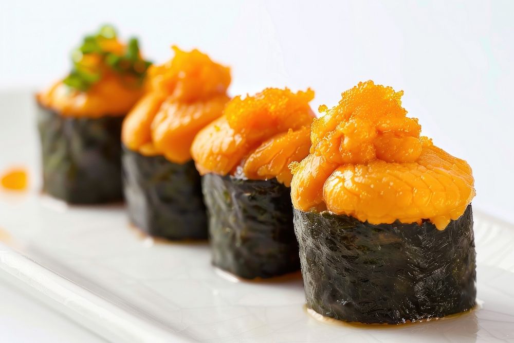 Uni sushi dish produce grain.