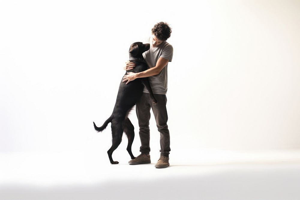 Person hugging a dog photo photography recreation.