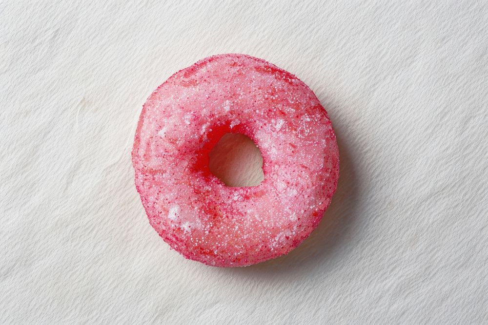 Pink donut food confectionery freshness.