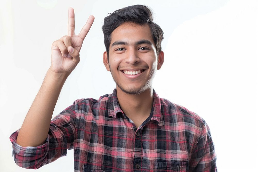 Person making a peace sign portrait cheerful finger.