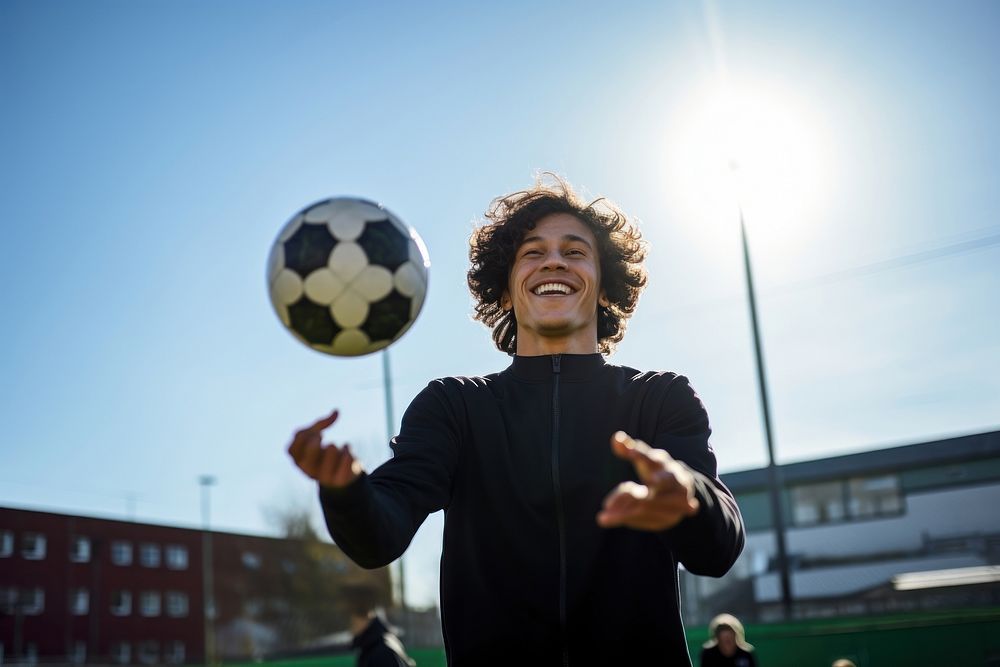 Young man juggles football sports soccer adult.