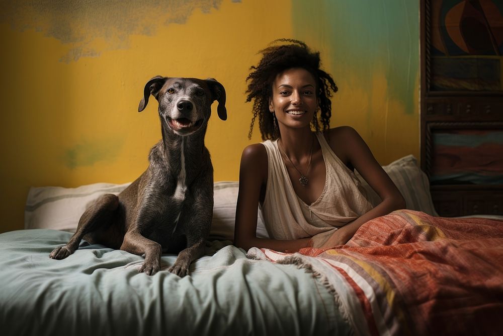 Happy african woman bedroom dog furniture.