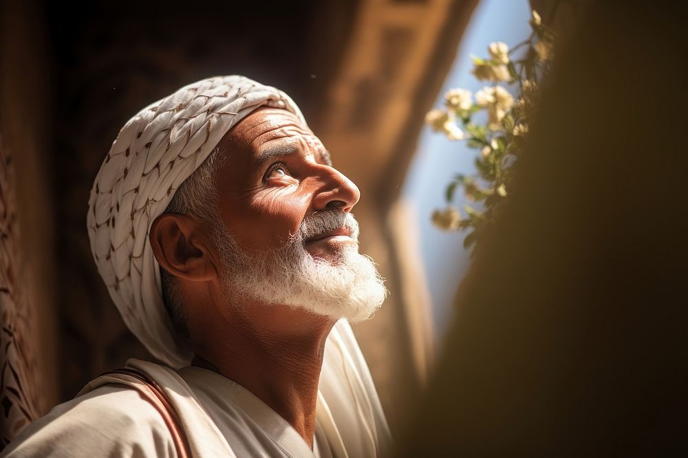 Arab man looking up face adult contemplation spirituality.