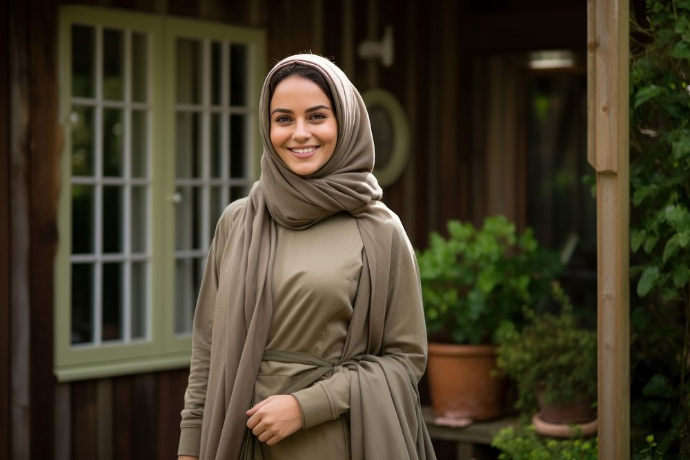 Arab woman smile face standing hijab scarf.