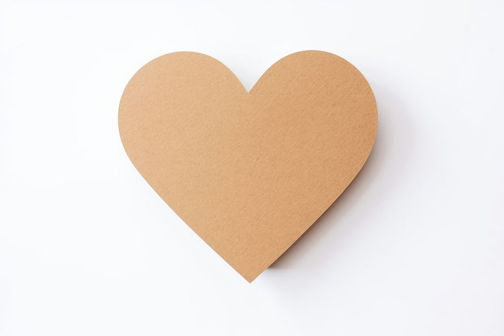 Heart made with cardboard white background creativity textured.