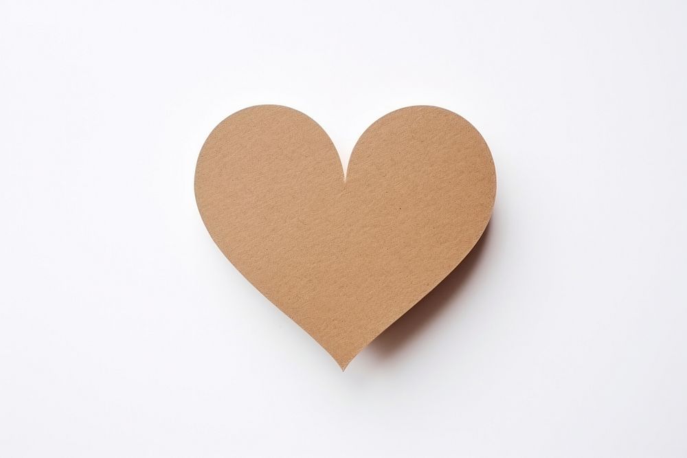 Heart made with cardboard white background creativity pattern.