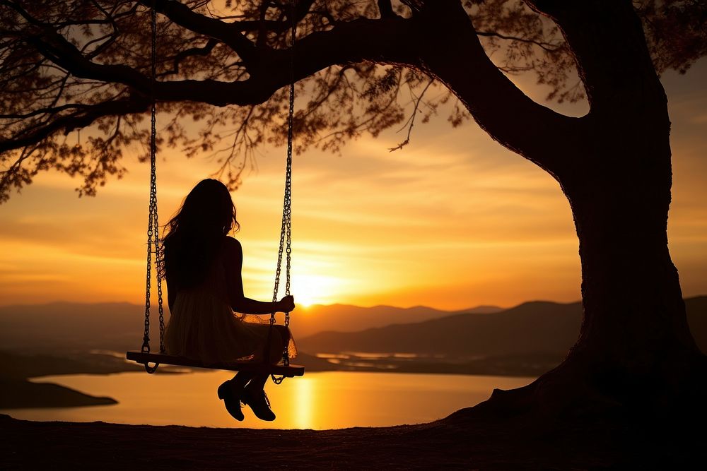 Girl on swing silhouette photography sitting girl tree.