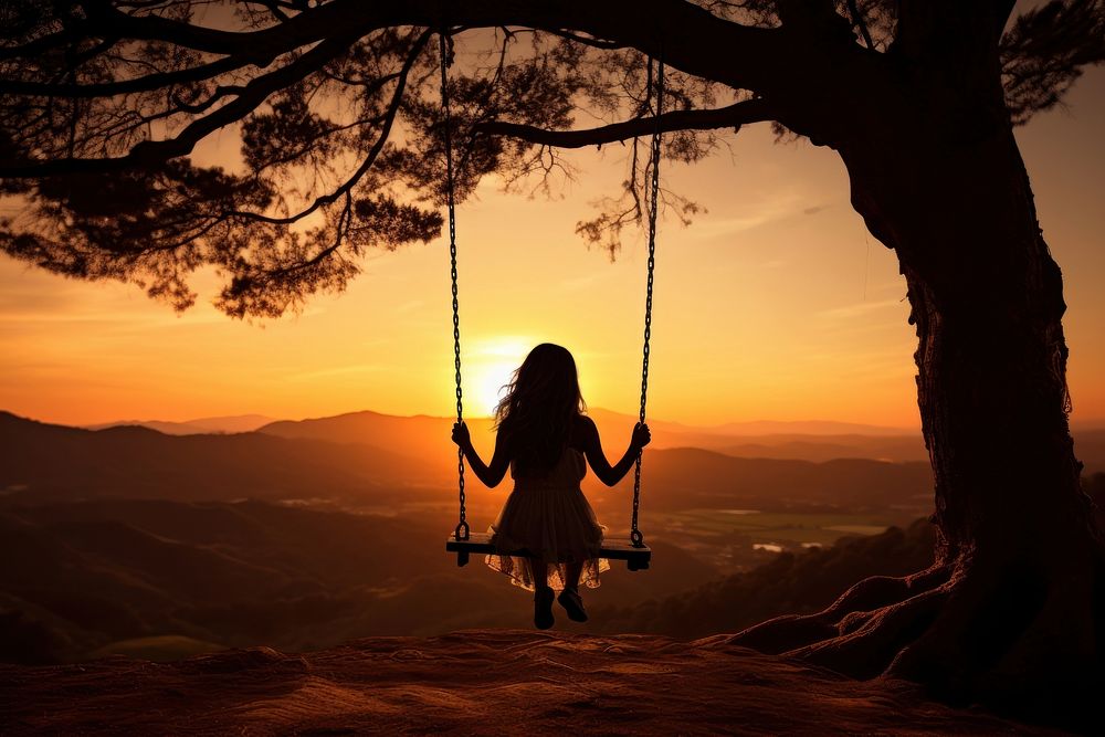 Girl on swing silhouette photography girl tree backlighting.