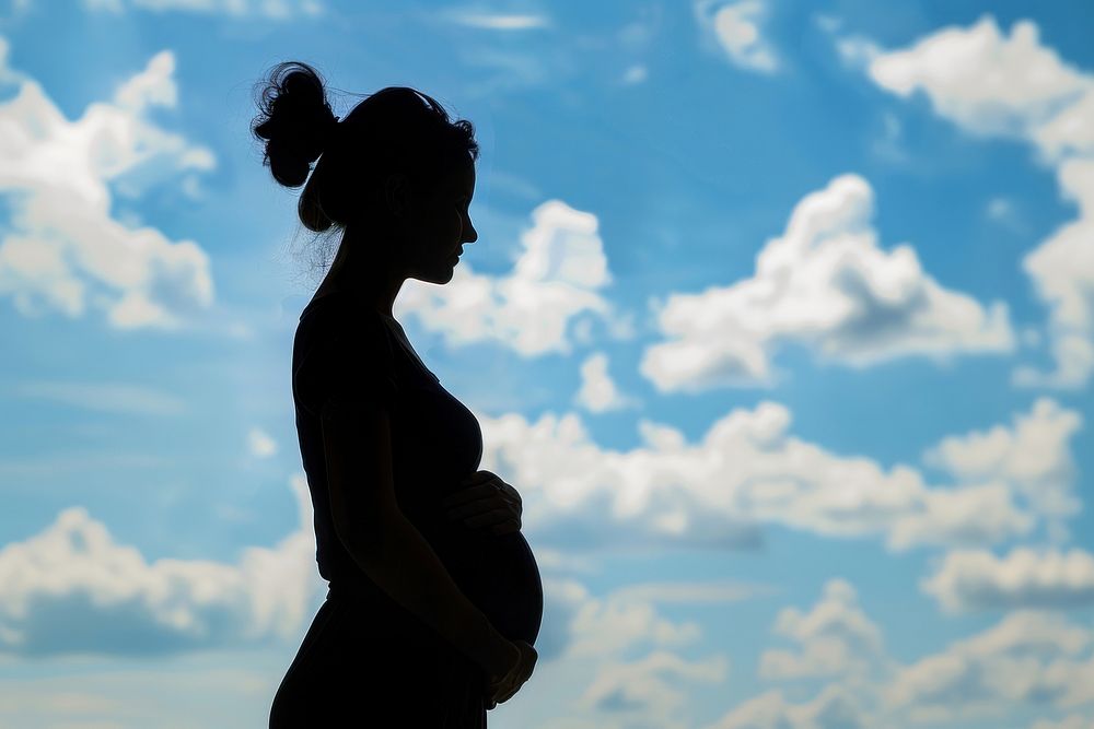 Pregnant woman silhouette photography backlighting female person.