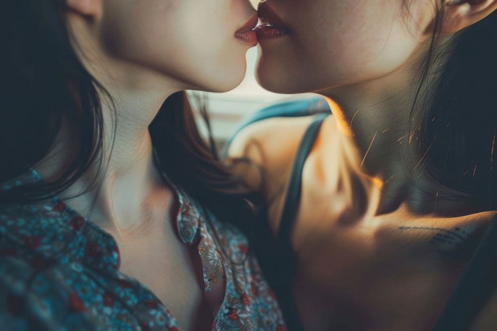 Thai lesbian couple romantic kissing person.