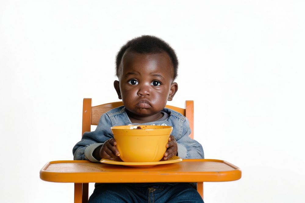 African American toddler sitting in a high chair photo bowl photography.