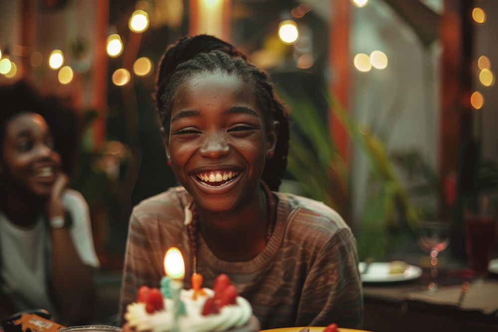 African teenage celebrating birthday party happy laughing people.