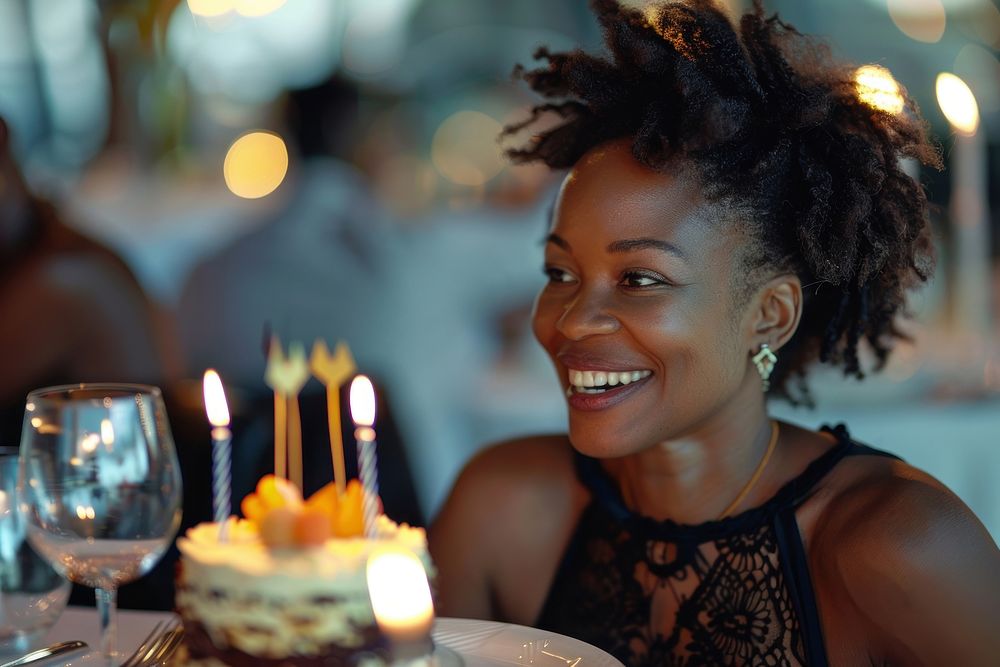 Woman African impressed with birthday cake photo happy photography.