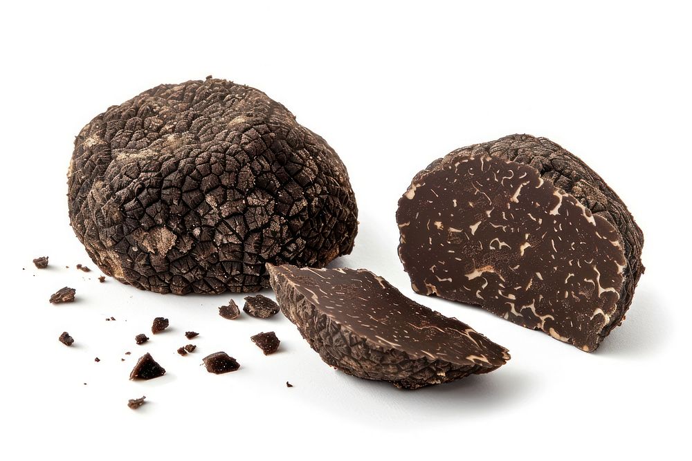Black truffles full piece and half piece confectionery chocolate dessert.
