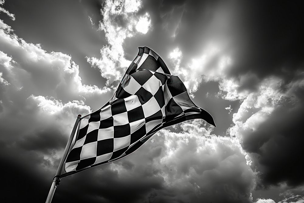 Checkered black and white flag sky outdoors weather.