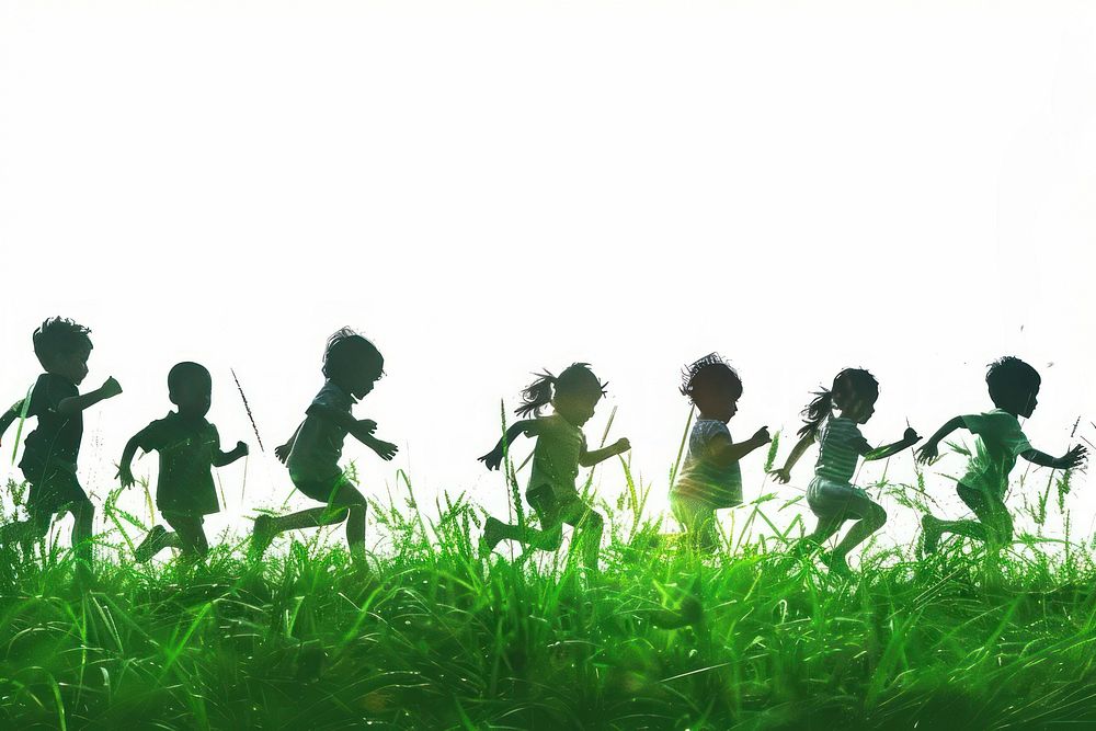 Children running through green grass photo photography vegetation.