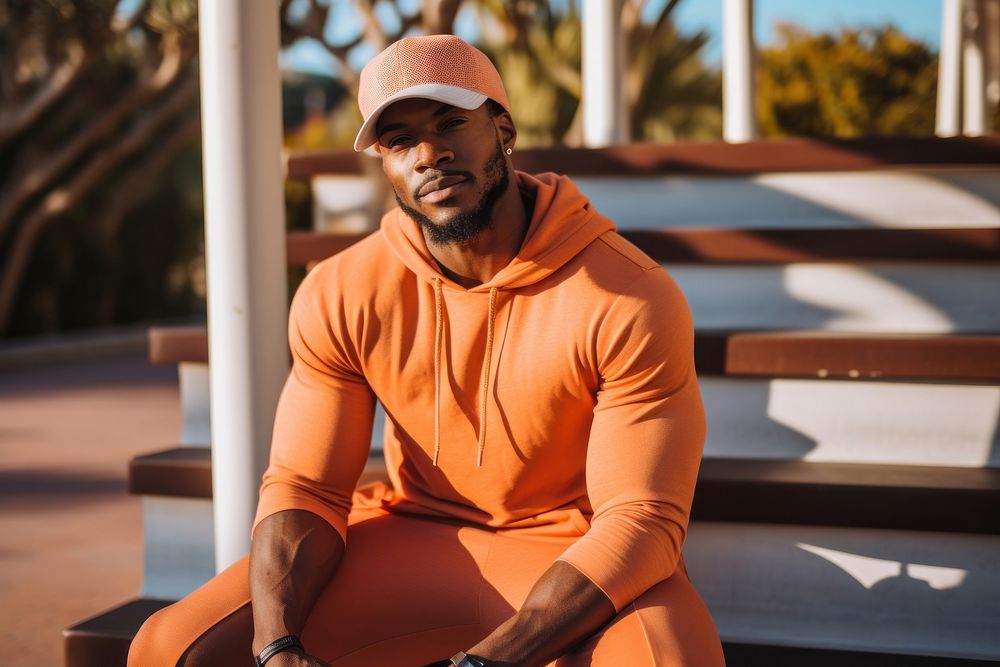African American fitness influencer clothing sitting apparel.