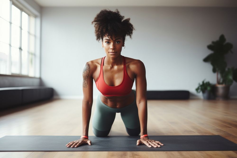 Black woman fitness exercise pilates.