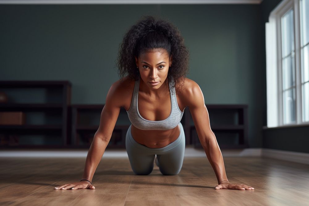 Black woman fitness exercise pilates.