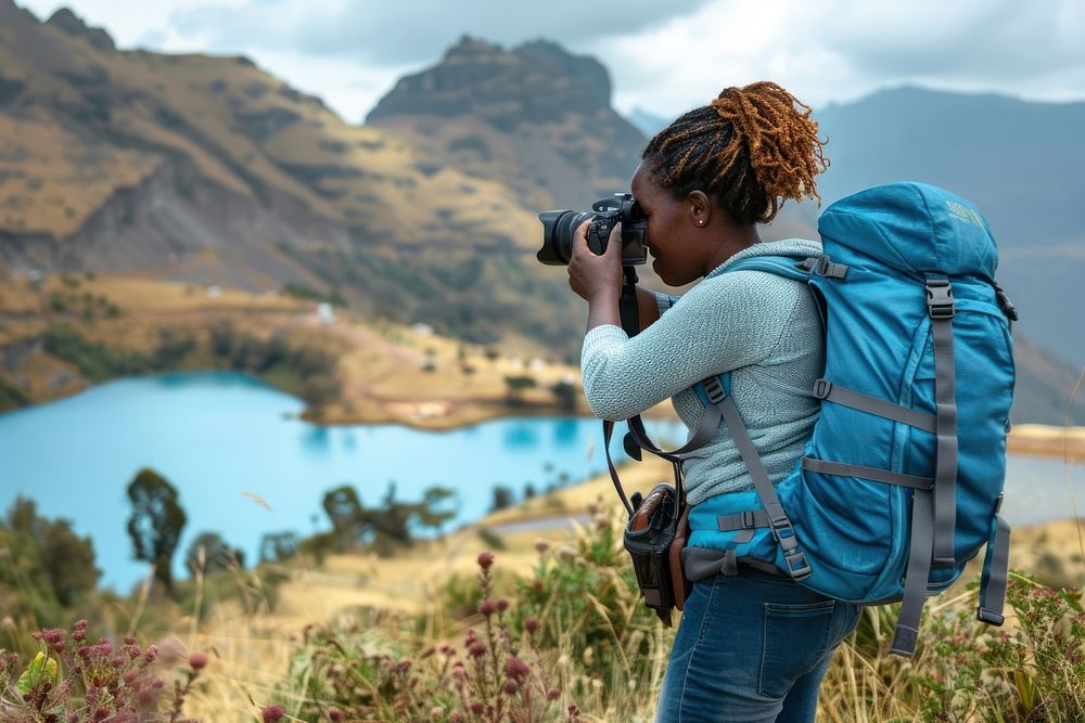 African Woman photographer backpack woman photography.