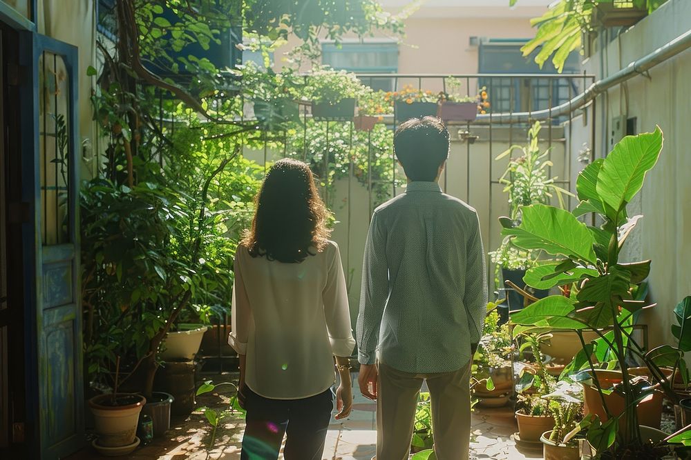 Vietnamese married couple garden architecture vegetation.