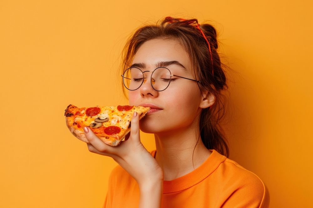 Woman wear glasses pizza person biting.