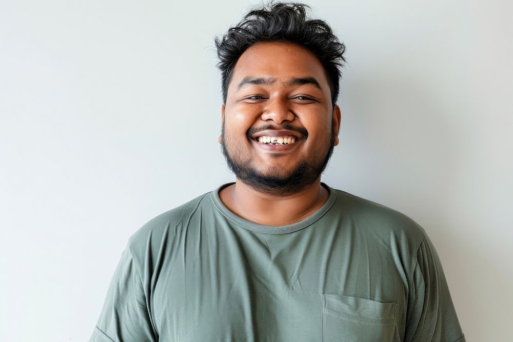 Obese south asian male smile laughing dimples.