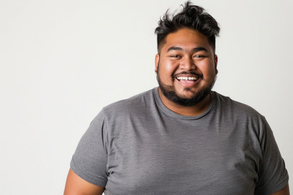 Obese south asian male t-shirt smile photo.