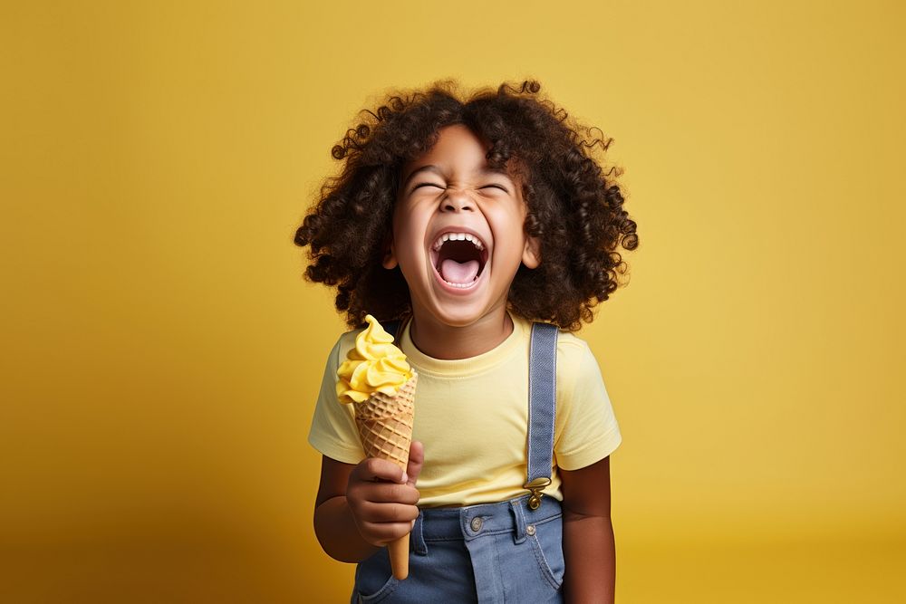 Black kid eating ice cream shouting laughing person.