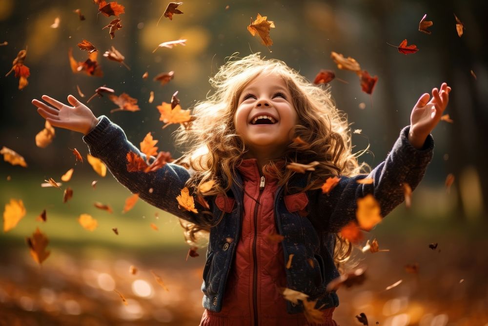 Kid joyfully autumn photography portrait.