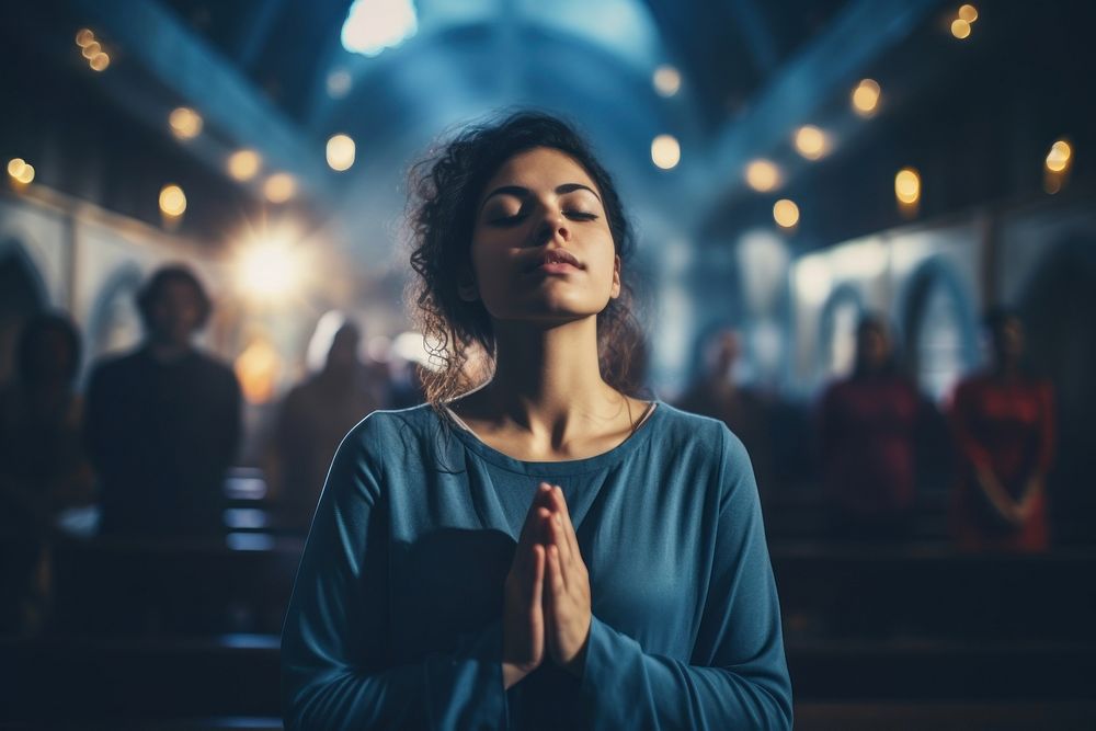Praying woman worship female.