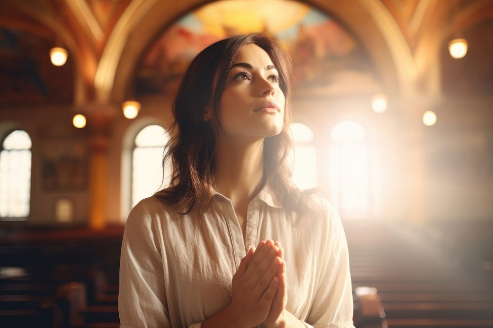 Praying in modern church woman worship female.