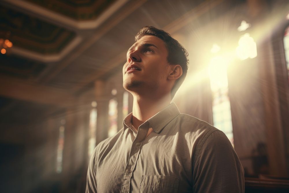 Praying in modern church man photography portrait.