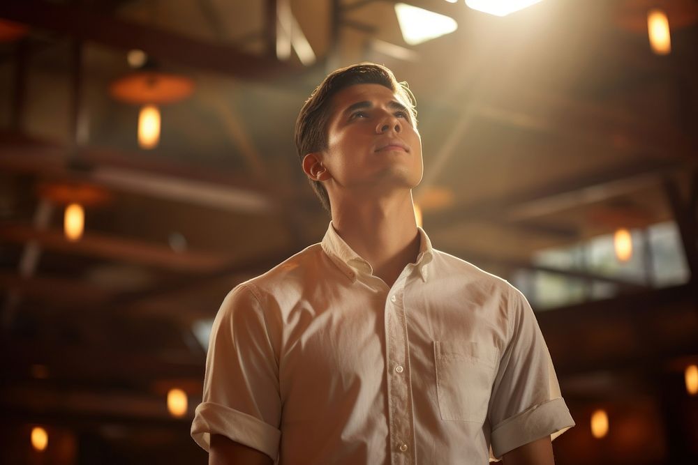 Praying in modern church shirt man photography.