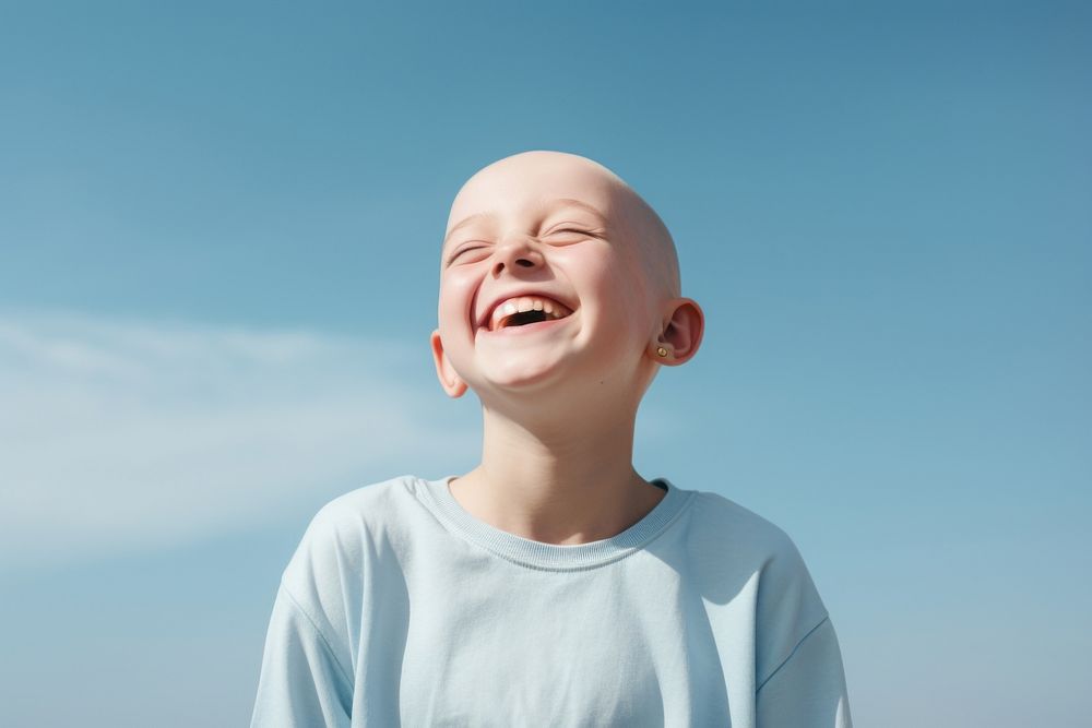 Bald kid laughing person happy human.