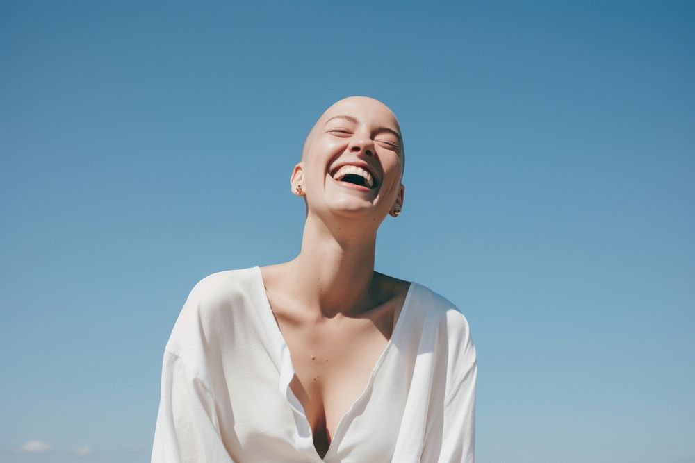 Bald woman laughing person female happy.
