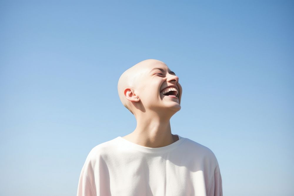 Bald woman laughing person female human.
